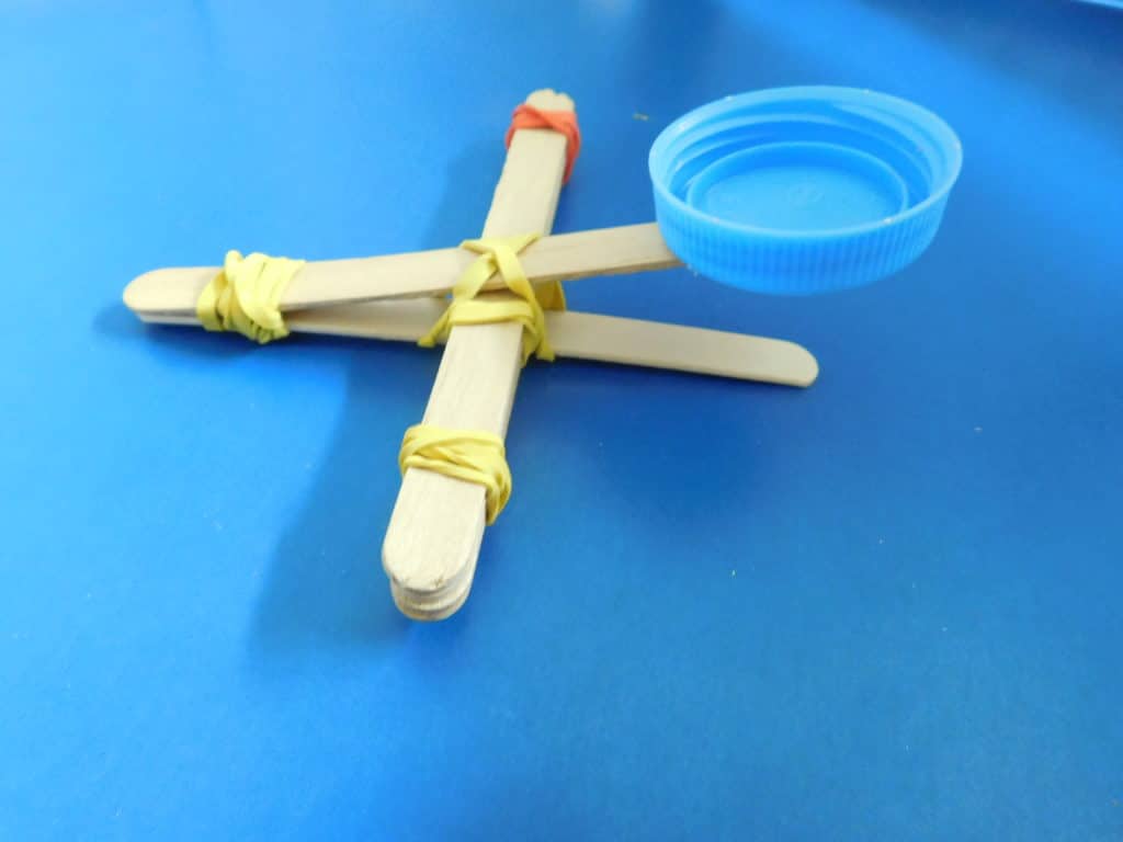 Homeschool activities with craft sticks- catapult