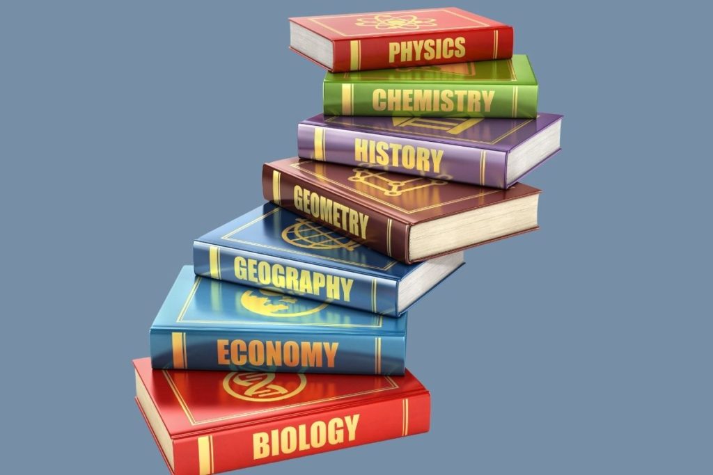 reevaluate your homeschool curriculum, stack of school books