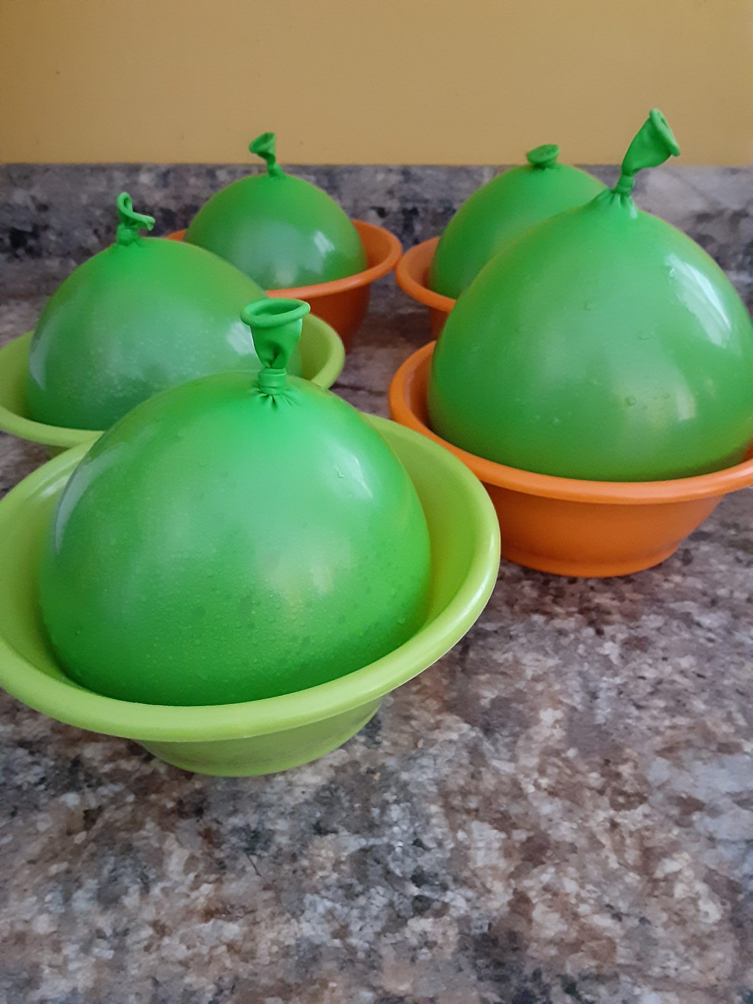 Water balloons in bowls ready