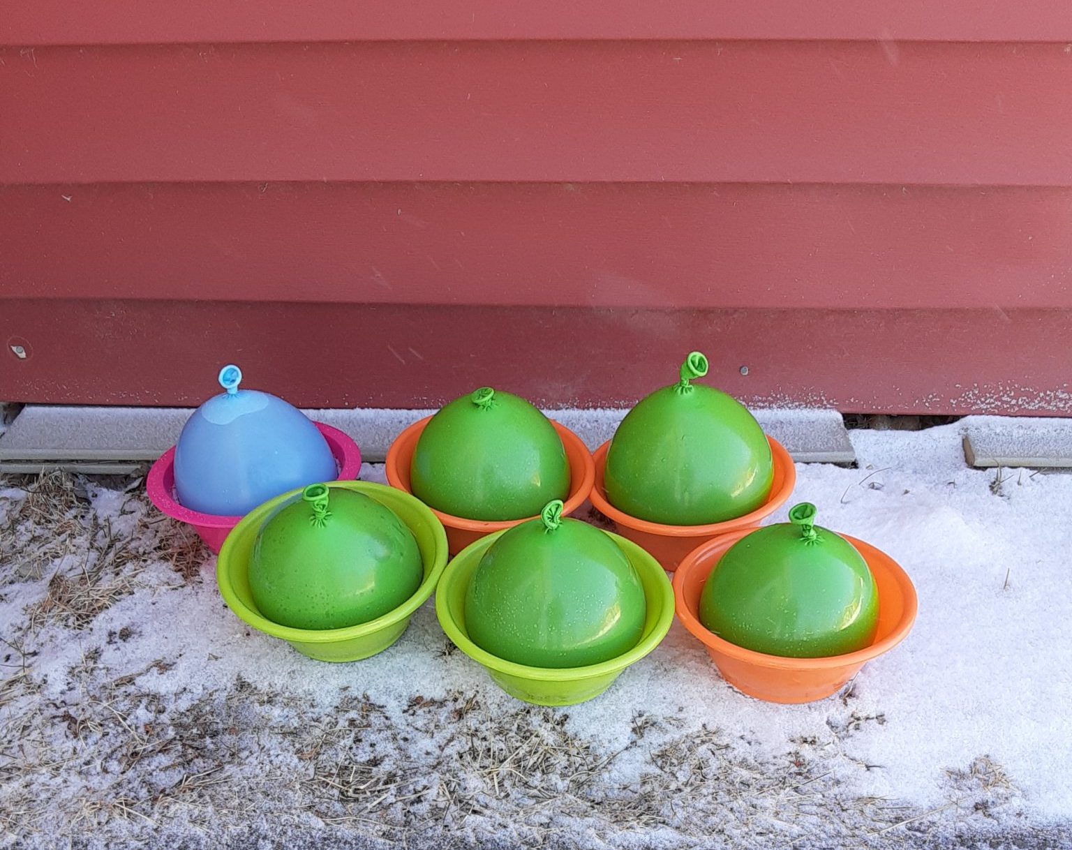 water balloons set outside to freeze for ice bowling