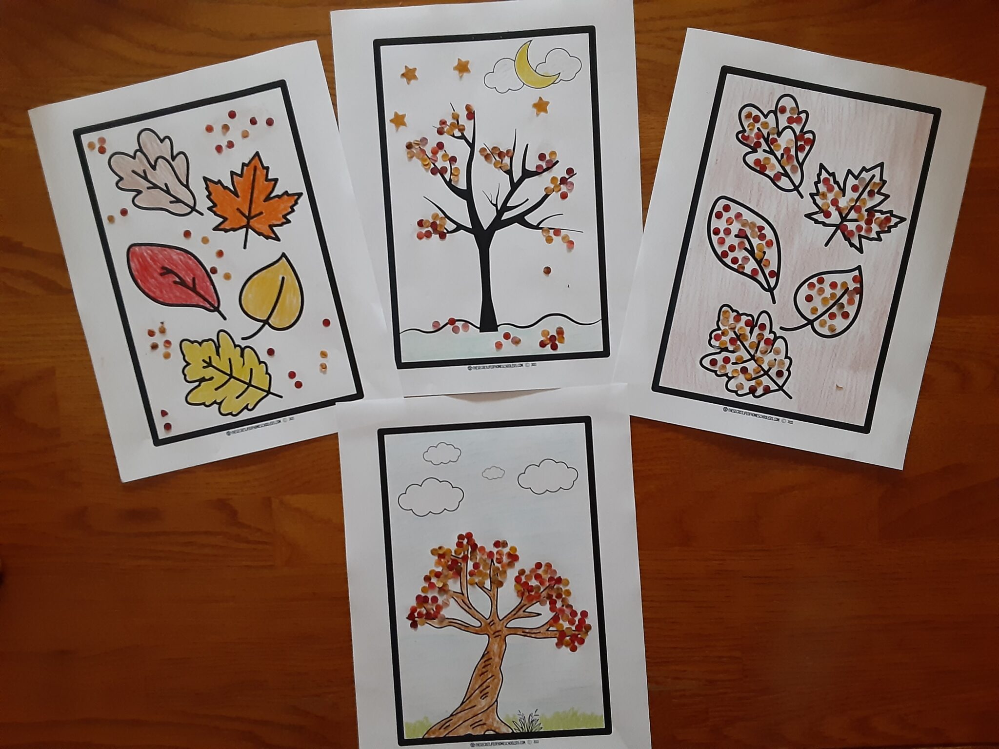 four worksheets completed for fall craft