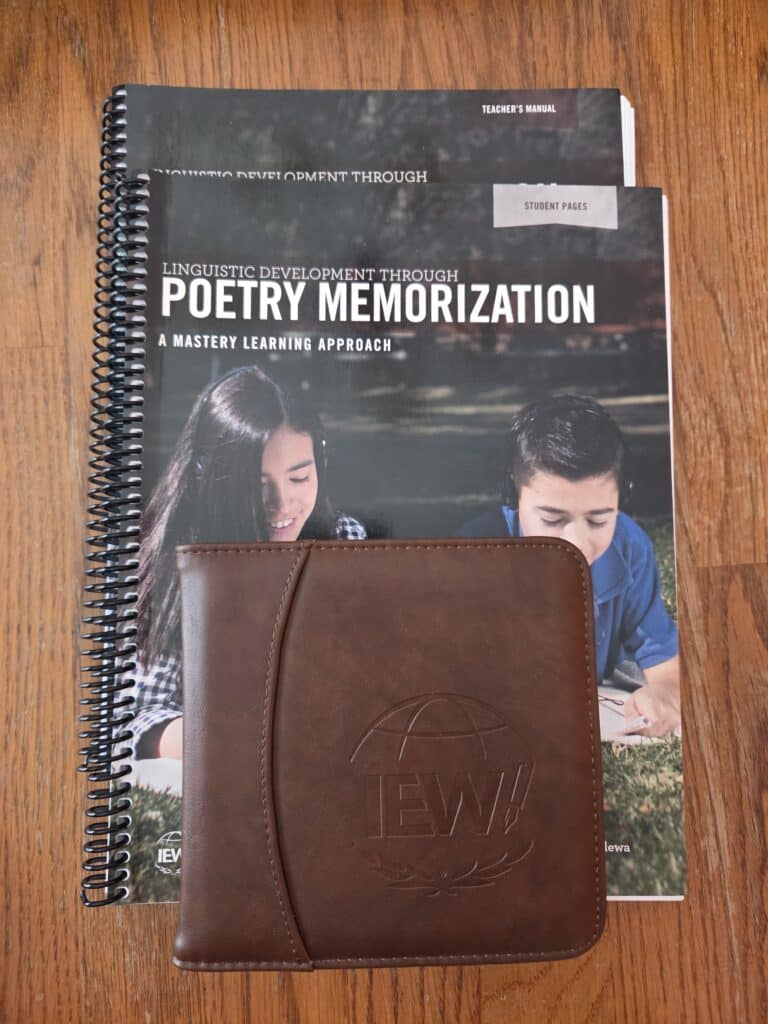 Picture showing the CD case, teacher manual, student manual for IEWs memorization program